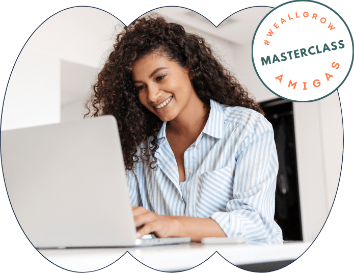 Woman using the computer and Masterclass Amigas logo