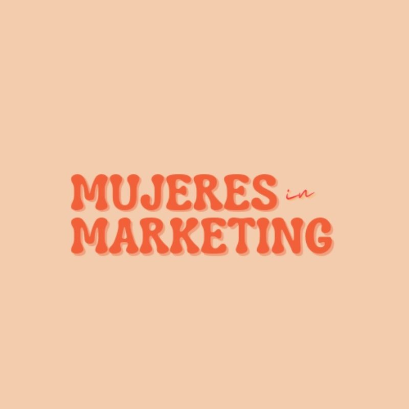 The logo for the #WeAllGrow Amigahood Circle, Mujeres Marketing. 