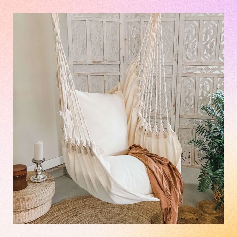 A white hammock chair swing by Latina brand Limbo Imports shown as a Mother's Day Gift.